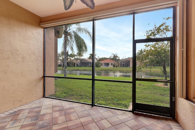 10623 Silverton Ln, Boynton Beach, FL 33437 - unfurnished sunroom featuring a water view, plenty of natural light, and a residential view