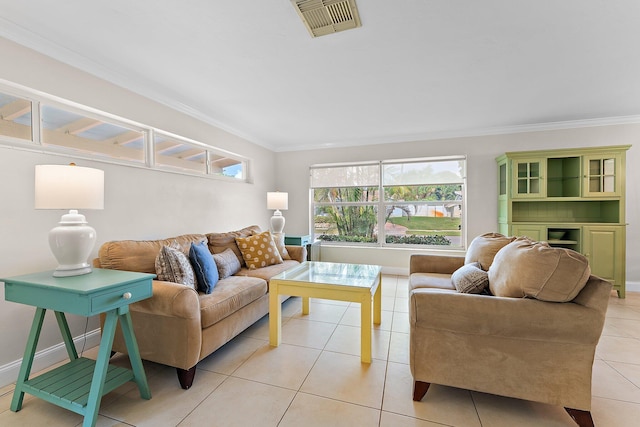 living room featuring light tile patterned floors and crown molding