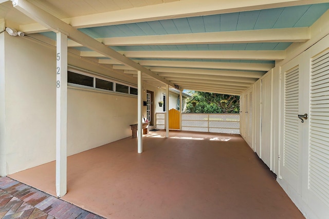 view of patio / terrace featuring a carport