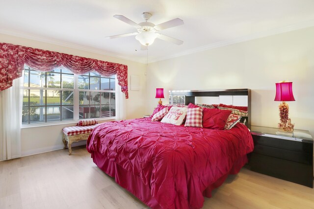 dining space featuring ceiling fan with notable chandelier and light hardwood / wood-style floors