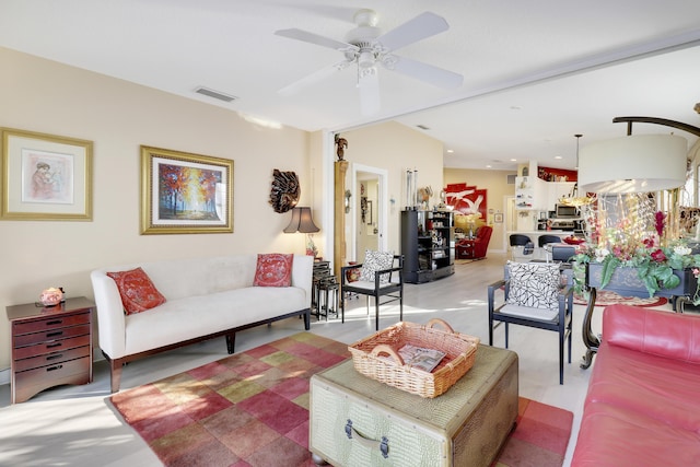 living room featuring ceiling fan