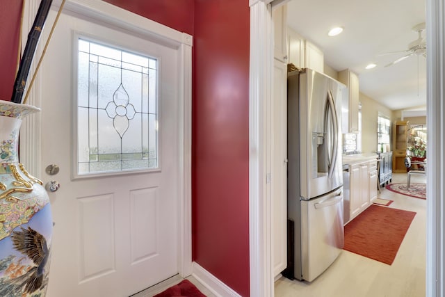 interior space featuring ceiling fan and light hardwood / wood-style floors