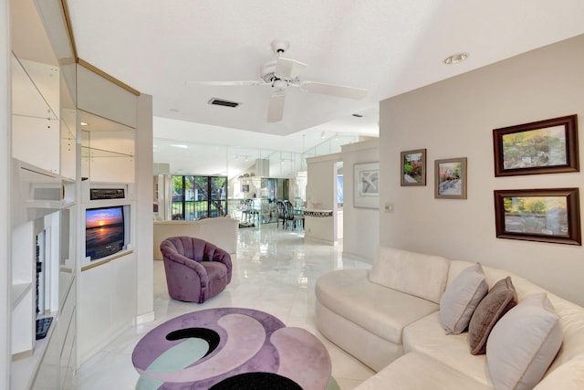 living room featuring ceiling fan