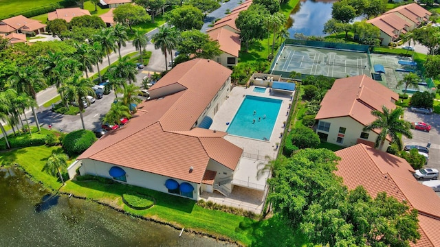 birds eye view of property featuring a water view