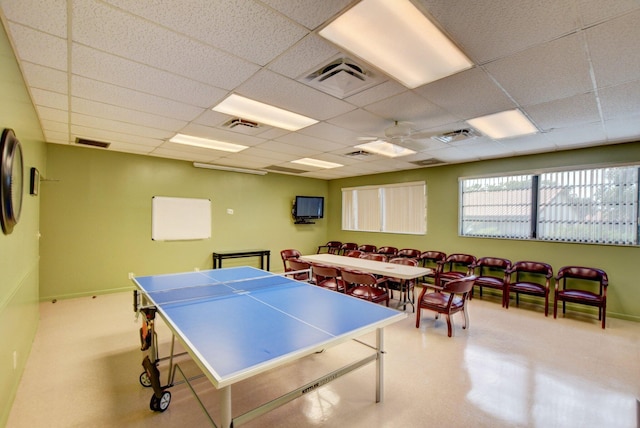 rec room featuring a paneled ceiling