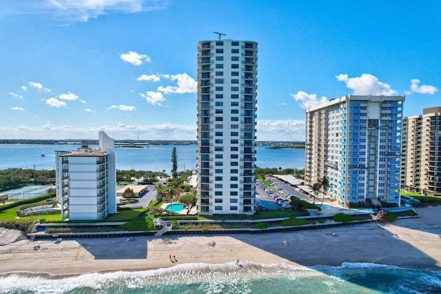 aerial view featuring a water view and a view of the beach