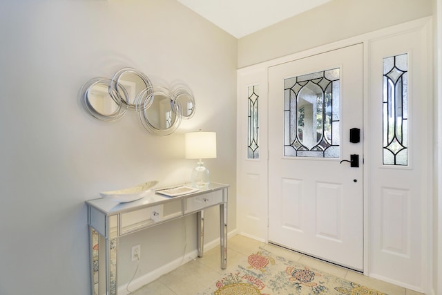 foyer featuring light tile patterned floors