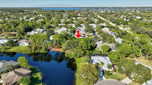 bird's eye view featuring a residential view and a water view