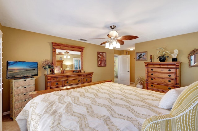 bedroom featuring a ceiling fan and visible vents