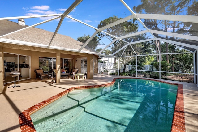 view of pool with an outdoor hangout area, a patio, fence, and a fenced in pool