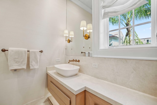 bathroom featuring backsplash and vanity