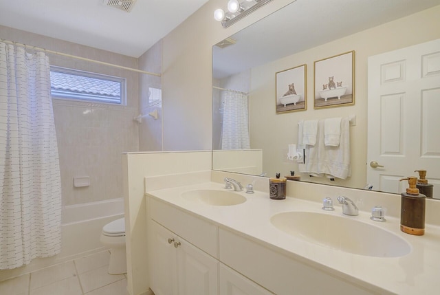 full bathroom featuring toilet, vanity, tile patterned floors, and shower / tub combo with curtain