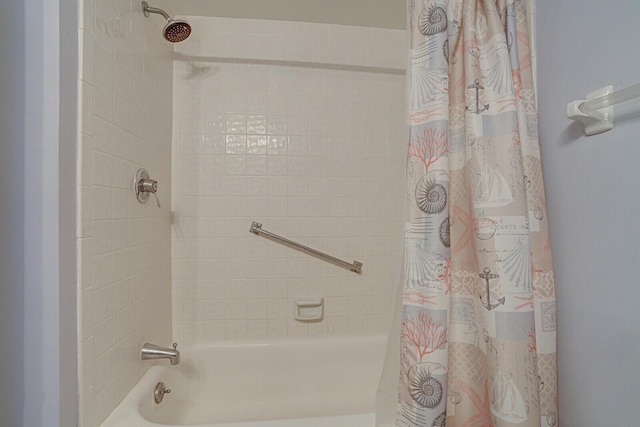 bathroom featuring shower / bath combo with shower curtain