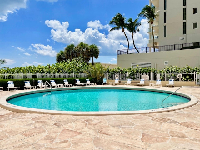 view of pool featuring a patio