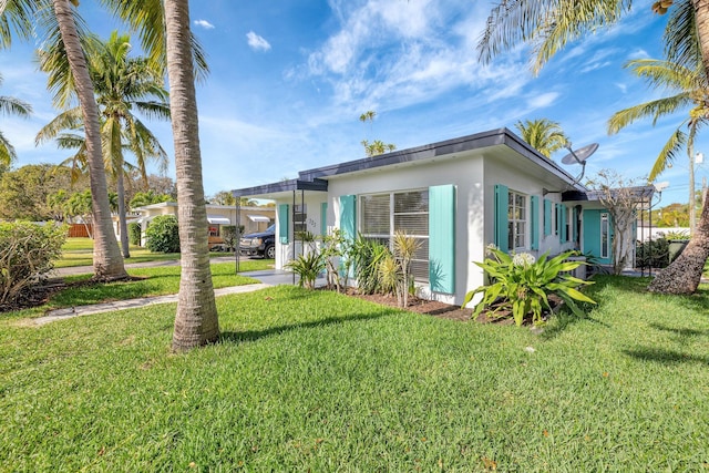 view of property exterior featuring a lawn