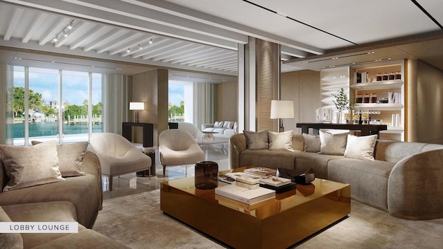 living room featuring beam ceiling and a water view