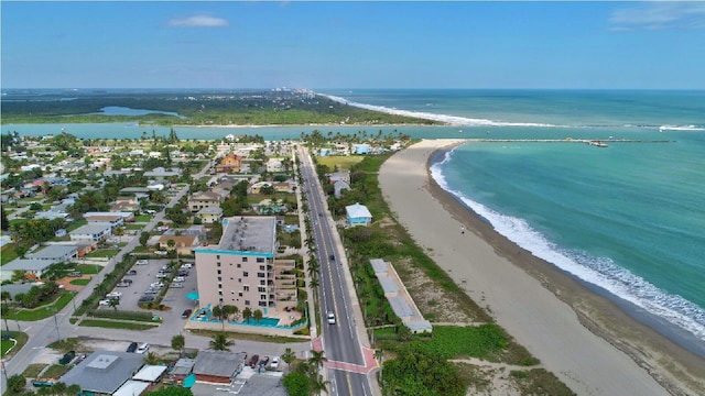 aerial view with a beach view and a water view