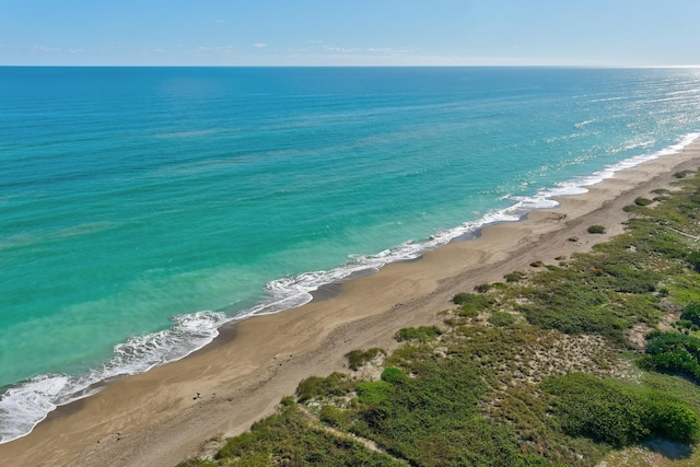 property view of water featuring a beach view