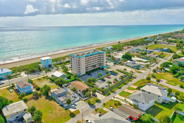 aerial view featuring a beach view and a water view