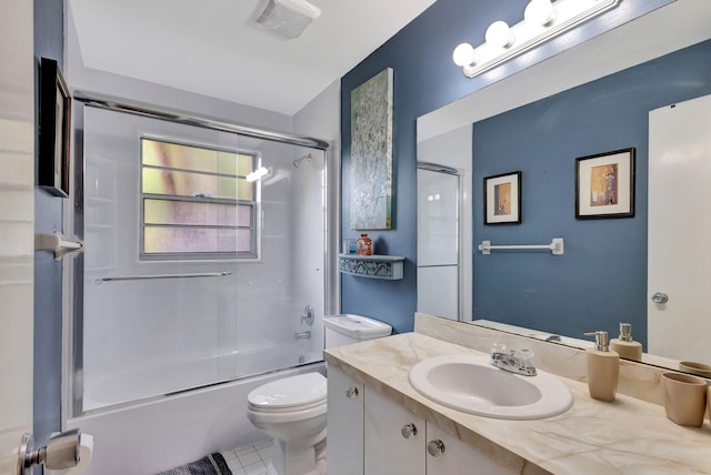 full bathroom featuring tile patterned flooring, vanity, enclosed tub / shower combo, and toilet