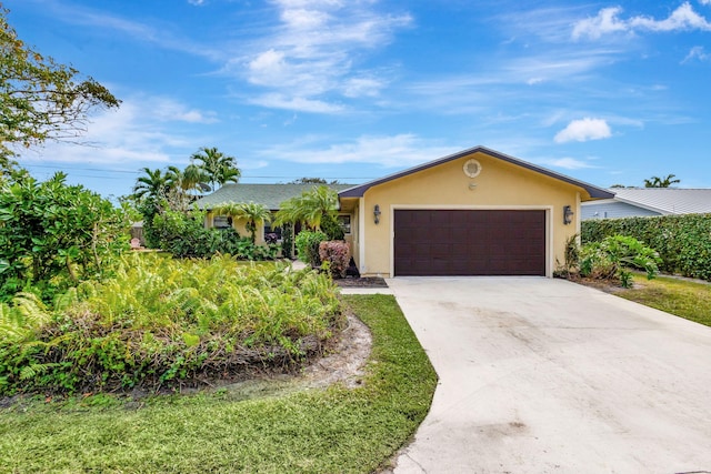 single story home with a garage