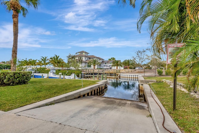 property view of water featuring a boat dock