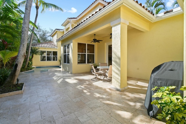 view of patio / terrace with a grill and ceiling fan