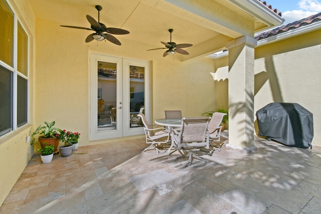 view of patio with ceiling fan, a grill, and french doors