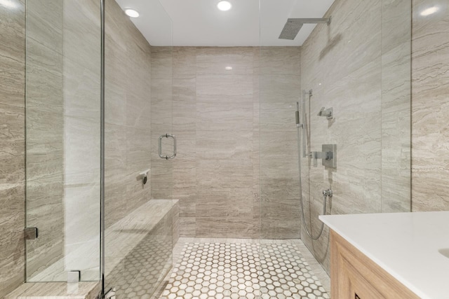 bathroom with vanity and walk in shower