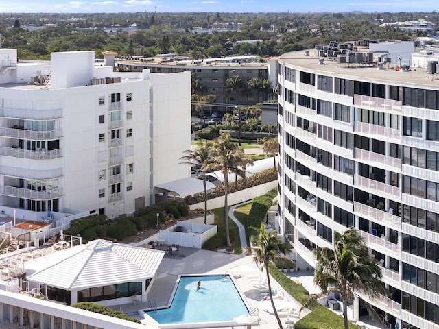 view of property featuring a community pool