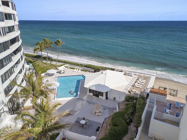 aerial view featuring a water view and a view of the beach