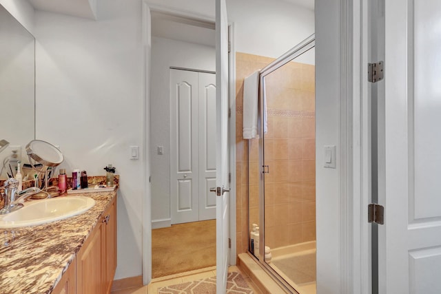 bathroom featuring vanity and walk in shower