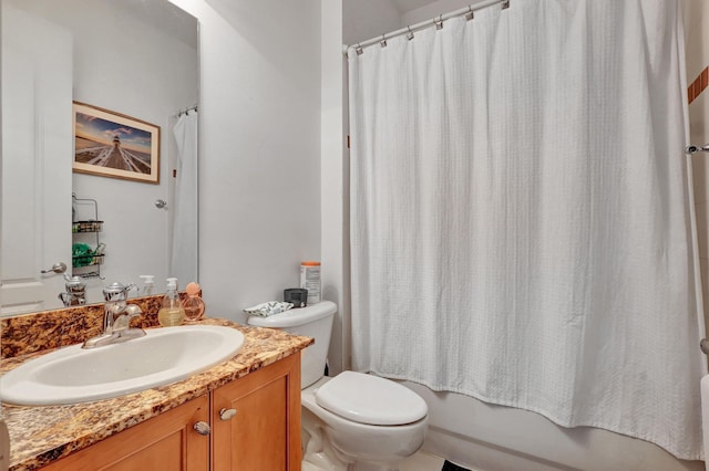 full bathroom with vanity, toilet, and shower / tub combo with curtain