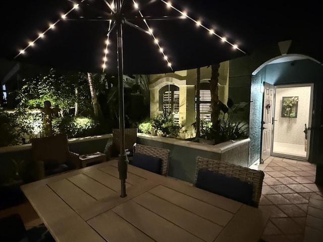 view of patio at night