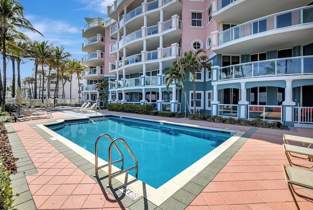 view of pool featuring a patio