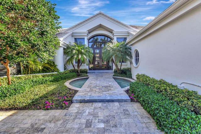 property entrance with french doors