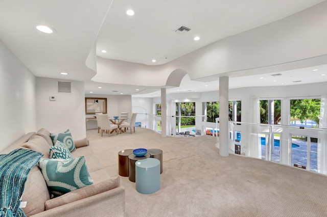 carpeted living room with french doors