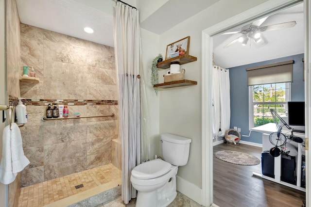 bathroom featuring hardwood / wood-style flooring, toilet, walk in shower, and ceiling fan