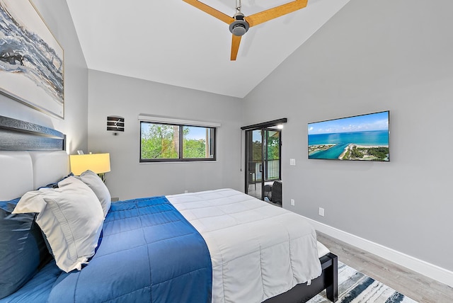 bedroom with ceiling fan, high vaulted ceiling, and light hardwood / wood-style floors