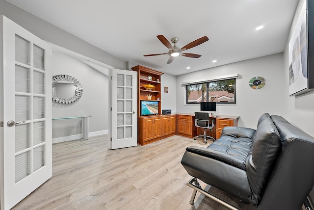 interior space with french doors, light wood-type flooring, and ceiling fan