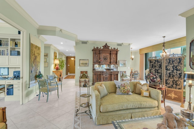 living room with crown molding, light tile patterned floors, and a chandelier