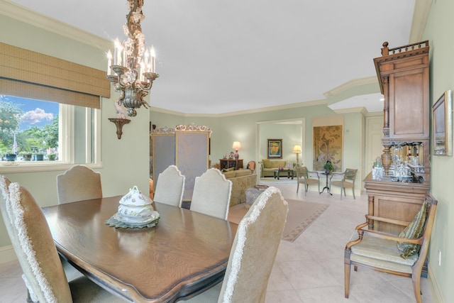 dining room with light tile patterned floors, an inviting chandelier, and ornamental molding