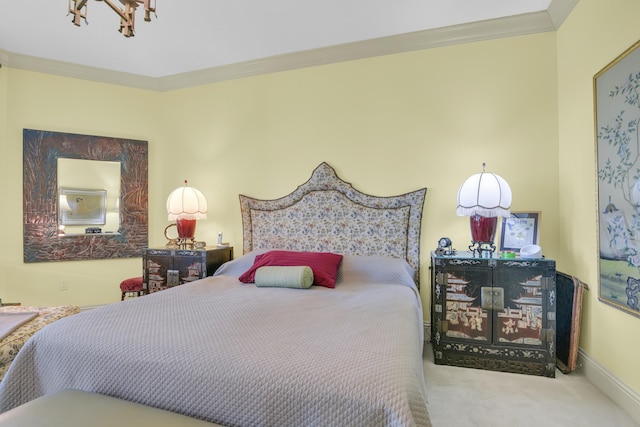 carpeted bedroom featuring crown molding