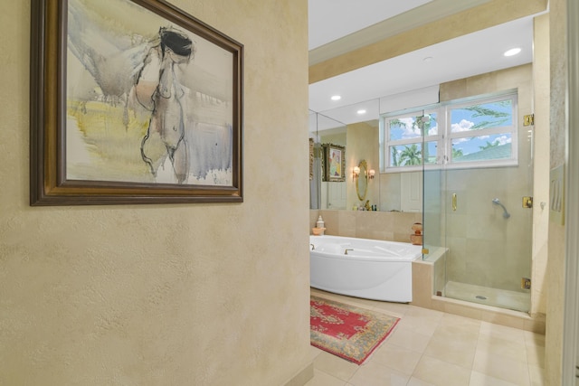 bathroom featuring shower with separate bathtub