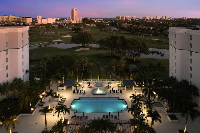 aerial view at dusk with a water view