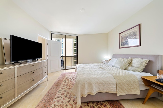 bedroom with expansive windows