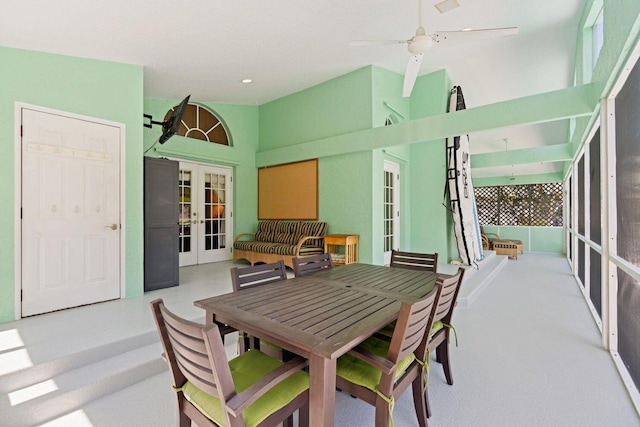 dining area with french doors and ceiling fan