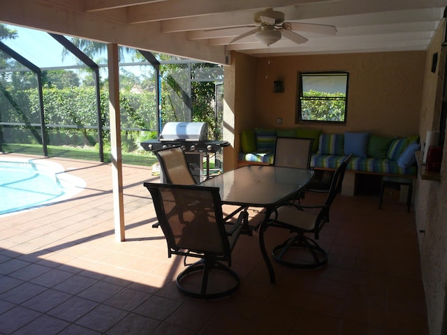 exterior space featuring ceiling fan and a wealth of natural light