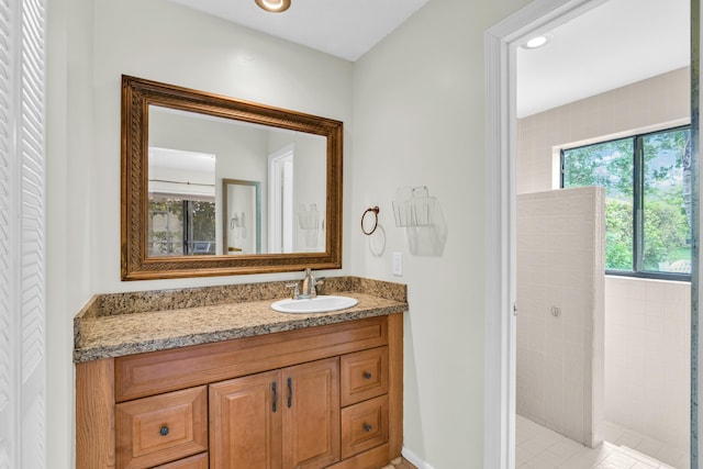 bathroom with vanity and recessed lighting