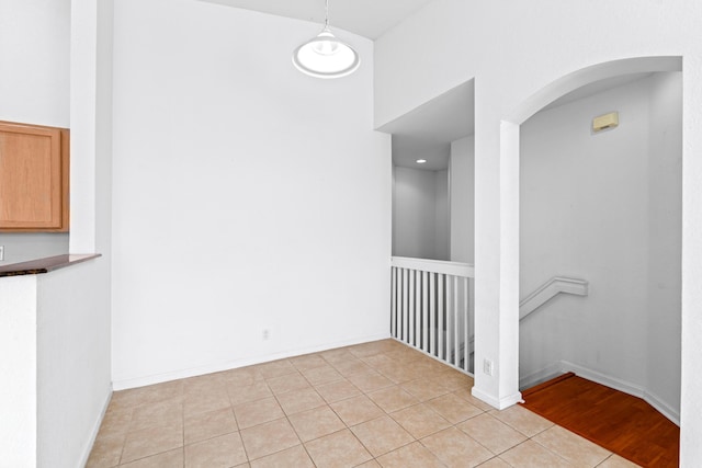 interior space with light tile patterned flooring